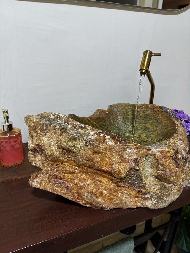 Sala de Estar — Poltrona junto à planta decorativa