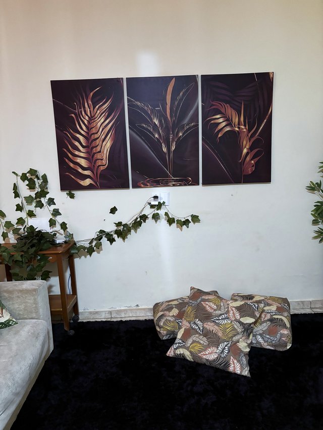 Sala de Estar — Almofadas estampadas com folhagens